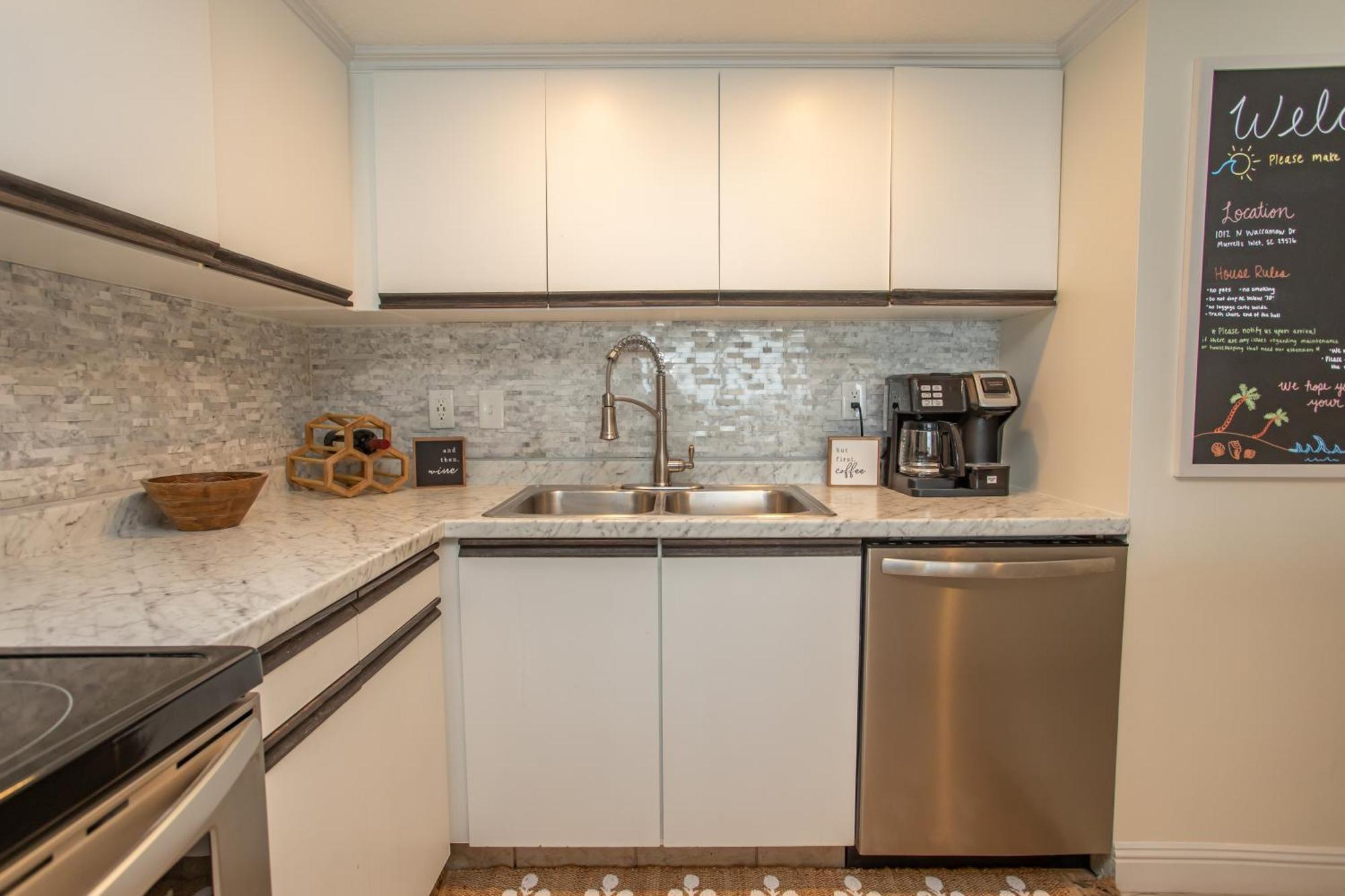 Aparthotel Waters Edge Garden City Esterno foto